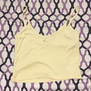 A yellow cami shirt